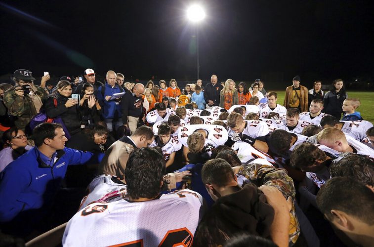 Supreme Court tackles case about praying football coach